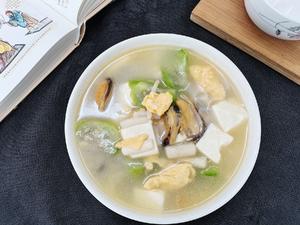 丝瓜豆腐鸡蛋菌菇贻贝汤的做法 步骤12